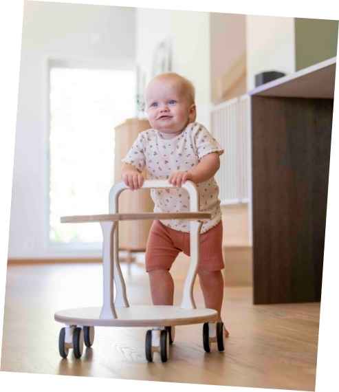 Happy baby with Hedda Sweden in kitchen